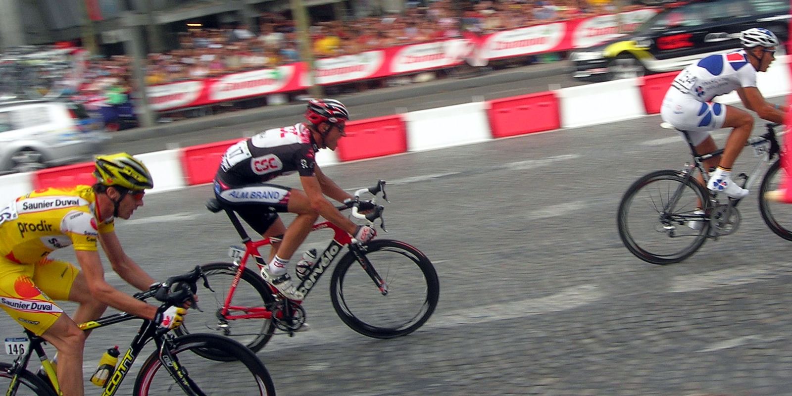 Riders racing along the Champs-Elysees on the final stage of the Tour de France